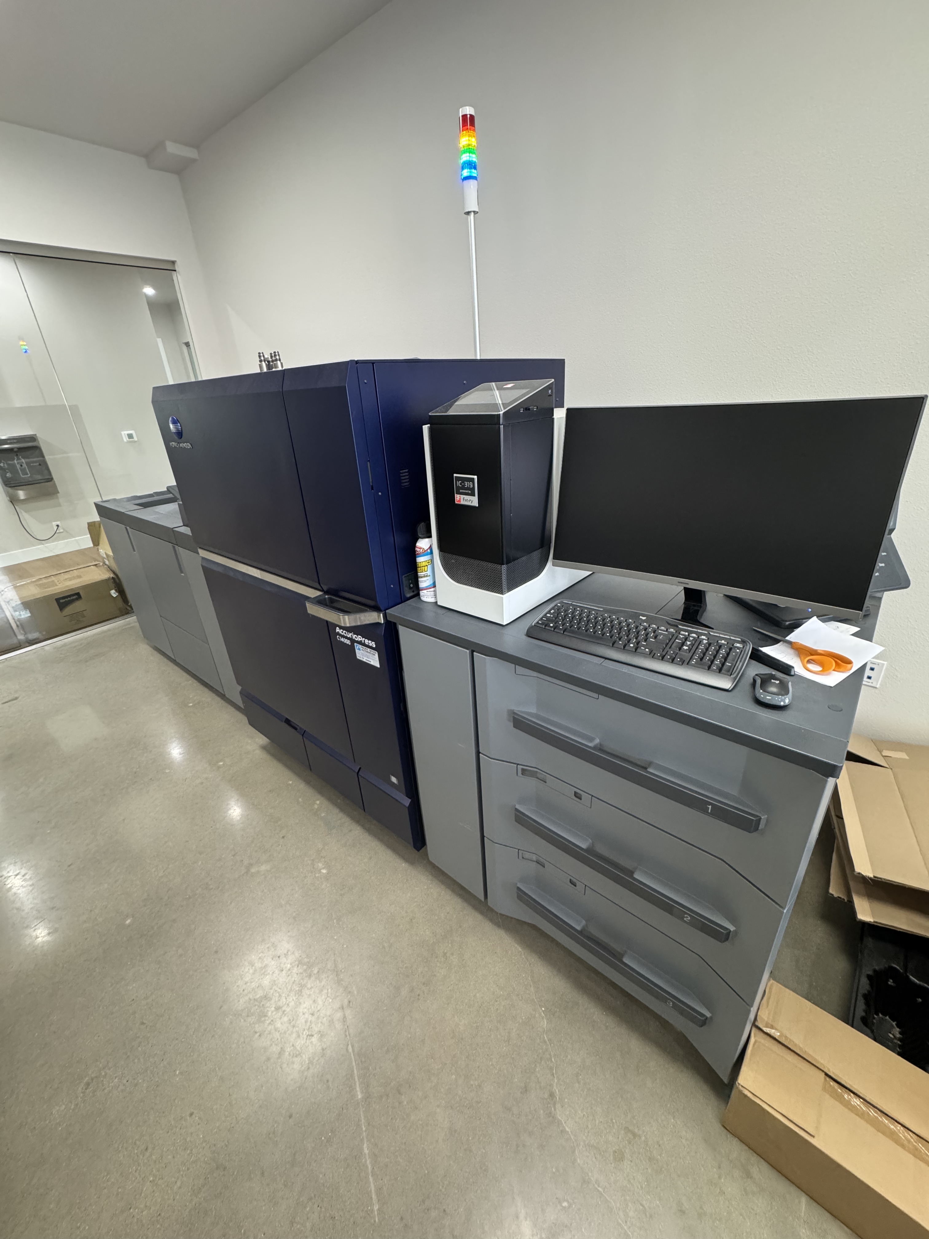 Konica press running a job